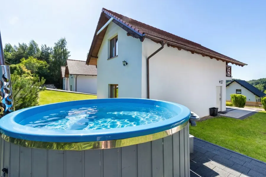 Hot tub by the house
