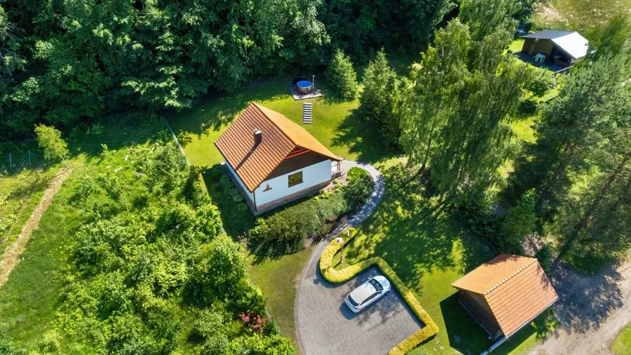 House among forests from a drone